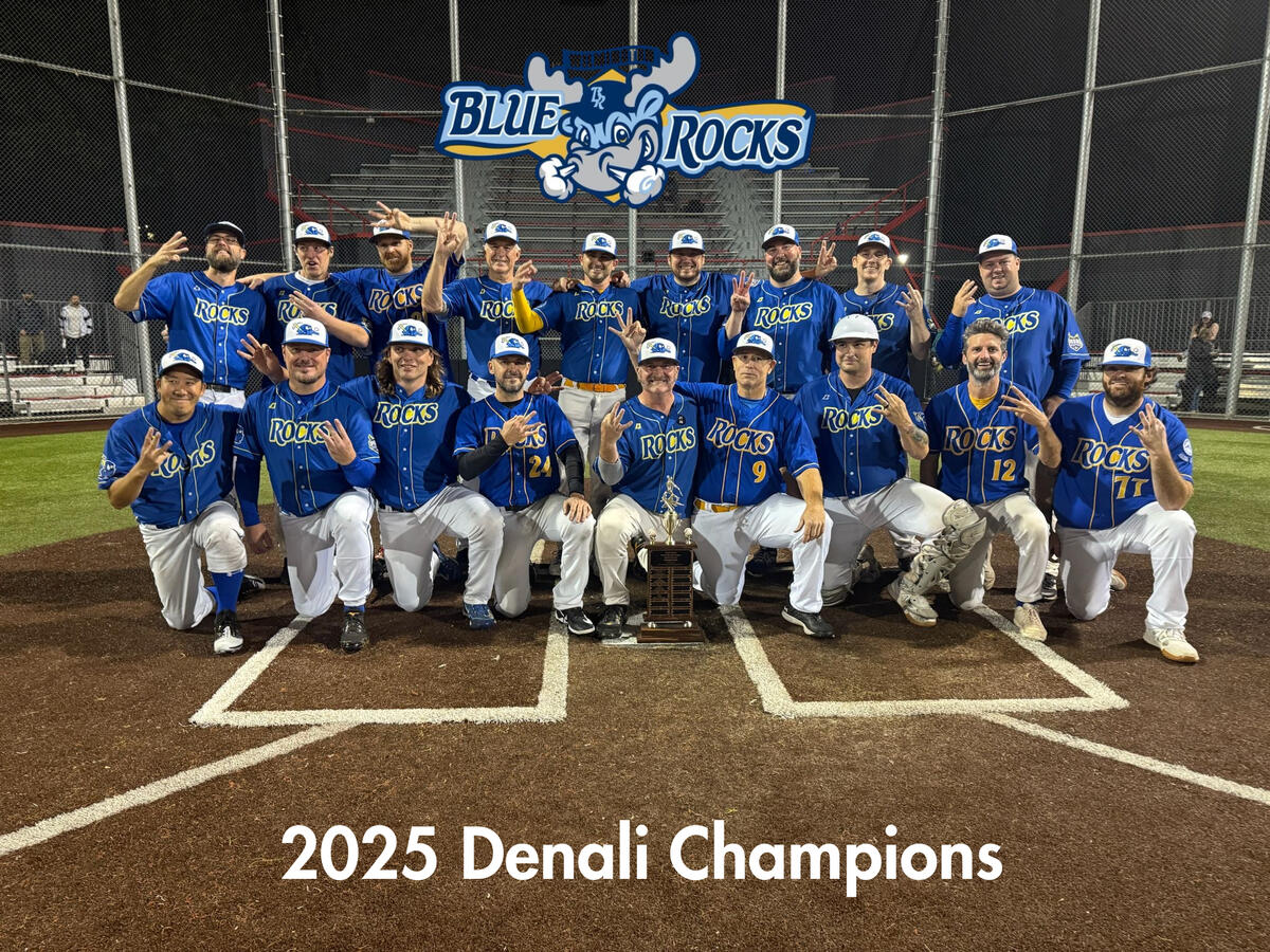 PSSBL Denali Blue Rocks team posed on the field with championship trophy
